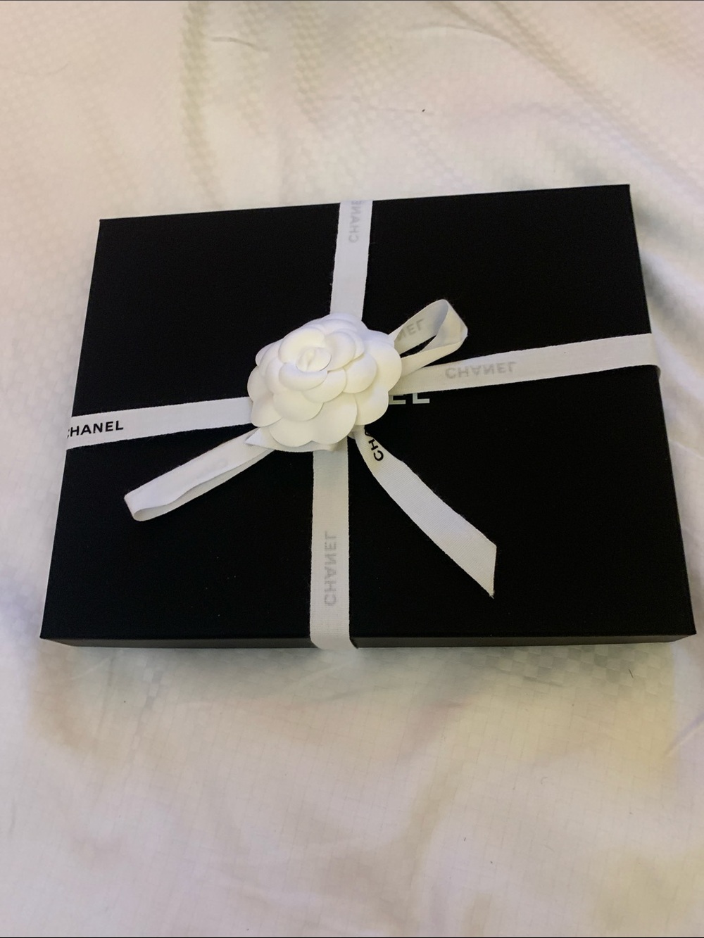 Rate and collectible authentic Chanel box mid size with ribbon , camellia , must